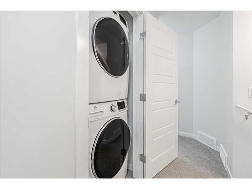 303 Cranbrook Square Se, Calgary, AB - Indoor Photo Showing Laundry Room