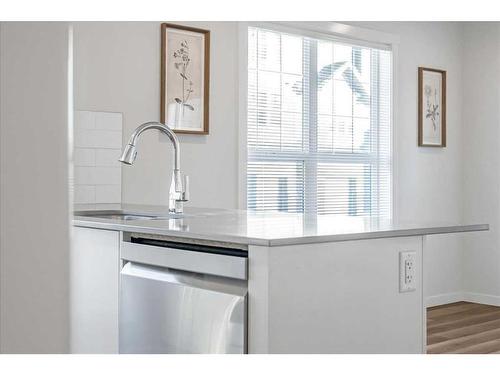 303 Cranbrook Square Se, Calgary, AB - Indoor Photo Showing Kitchen