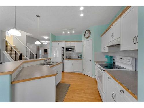 161 West Creek Boulevard, Chestermere, AB - Indoor Photo Showing Kitchen With Double Sink