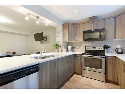 147 Cityscape Row Ne, Calgary, AB - Indoor Photo Showing Kitchen With Stainless Steel Kitchen With Double Sink