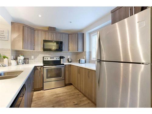 147 Cityscape Row Ne, Calgary, AB - Indoor Photo Showing Kitchen With Stainless Steel Kitchen With Double Sink With Upgraded Kitchen