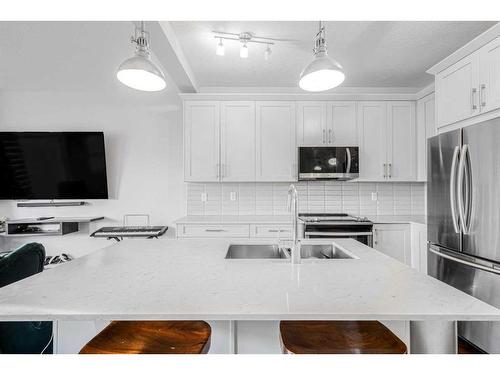 507-355 Nolancrest Heights Nw, Calgary, AB - Indoor Photo Showing Kitchen With Double Sink With Upgraded Kitchen