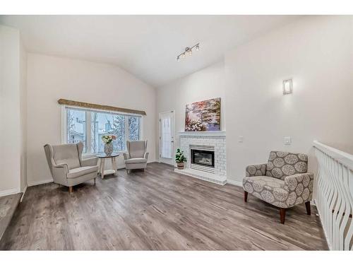 70 Sierra Vista Circle Sw, Calgary, AB - Indoor Photo Showing Living Room With Fireplace