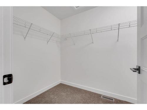 242 Baneberry Way Sw, Airdrie, AB - Indoor With Storage