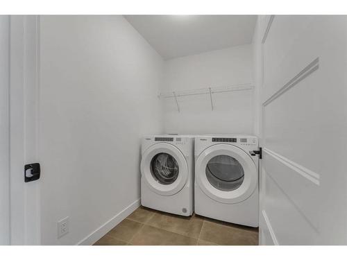 242 Baneberry Way Sw, Airdrie, AB - Indoor Photo Showing Laundry Room