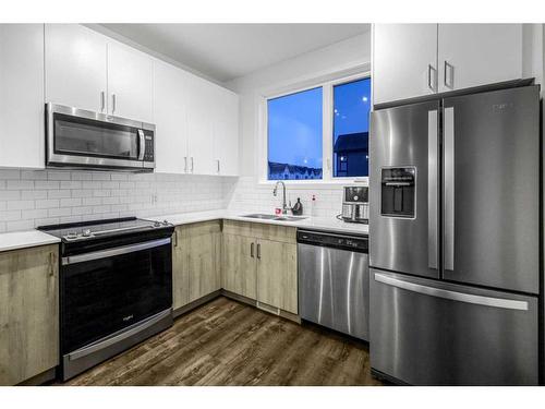 826 Belmont Drive, Calgary, AB - Indoor Photo Showing Kitchen With Stainless Steel Kitchen With Upgraded Kitchen