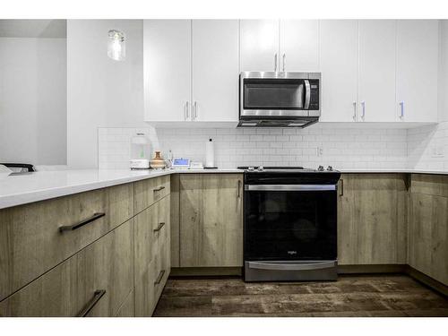 826 Belmont Drive, Calgary, AB - Indoor Photo Showing Kitchen With Upgraded Kitchen