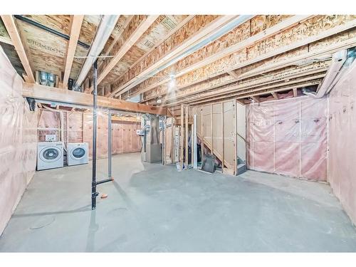 209 Evansmeade Close Nw, Calgary, AB - Indoor Photo Showing Basement