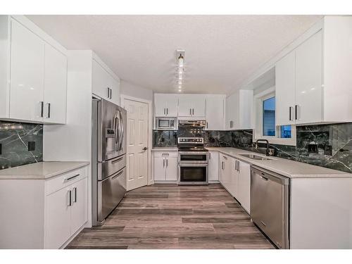 209 Evansmeade Close Nw, Calgary, AB - Indoor Photo Showing Kitchen With Stainless Steel Kitchen