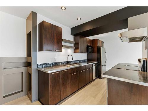 8-1530 26 Avenue Sw, Calgary, AB - Indoor Photo Showing Kitchen With Double Sink