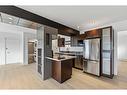 8-1530 26 Avenue Sw, Calgary, AB  - Indoor Photo Showing Kitchen With Stainless Steel Kitchen 