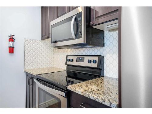 19654 42 Street Se, Calgary, AB - Indoor Photo Showing Kitchen With Stainless Steel Kitchen