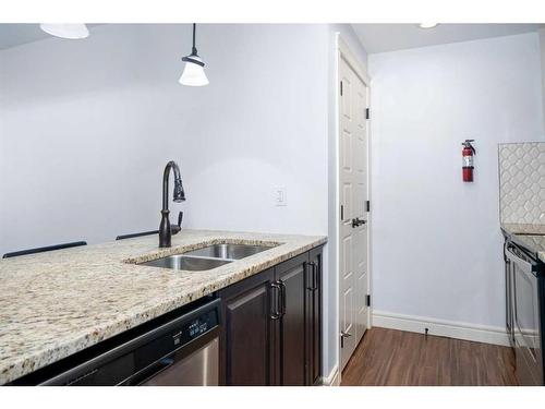 19654 42 Street Se, Calgary, AB - Indoor Photo Showing Kitchen With Double Sink