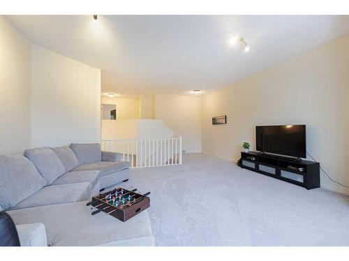 66 Tuscany Ridge Close Nw, Calgary, AB - Indoor Photo Showing Living Room