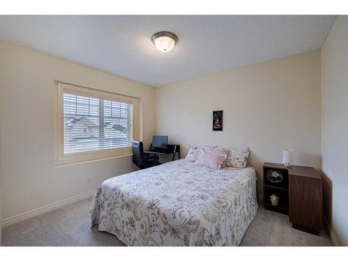 66 Tuscany Ridge Close Nw, Calgary, AB - Indoor Photo Showing Bedroom