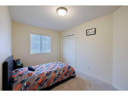 66 Tuscany Ridge Close Nw, Calgary, AB - Indoor Photo Showing Bedroom