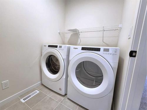 116 Setonstone Gardens Se, Calgary, AB - Indoor Photo Showing Laundry Room