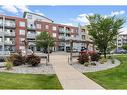 1314-604 East Lake Boulevard Ne, Airdrie, AB  - Outdoor With Balcony With Facade 