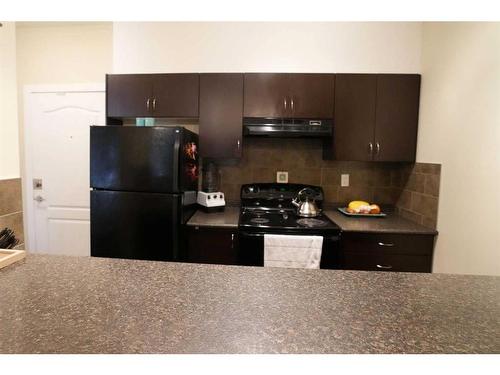 1314-604 East Lake Boulevard Ne, Airdrie, AB - Indoor Photo Showing Kitchen