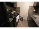 1314-604 East Lake Boulevard Ne, Airdrie, AB  - Indoor Photo Showing Kitchen 