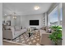 35 Redstone Way Ne, Calgary, AB  - Indoor Photo Showing Living Room 