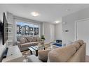 35 Redstone Way Ne, Calgary, AB  - Indoor Photo Showing Living Room 