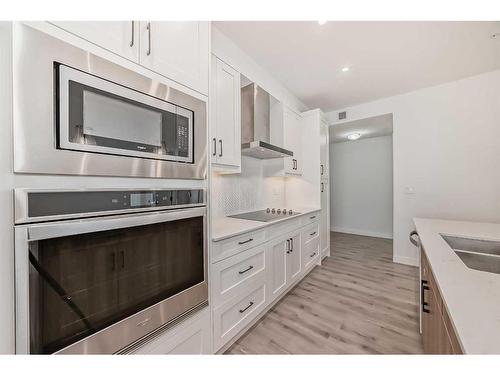 412-30 Sage Hill Nw, Calgary, AB - Indoor Photo Showing Kitchen With Double Sink