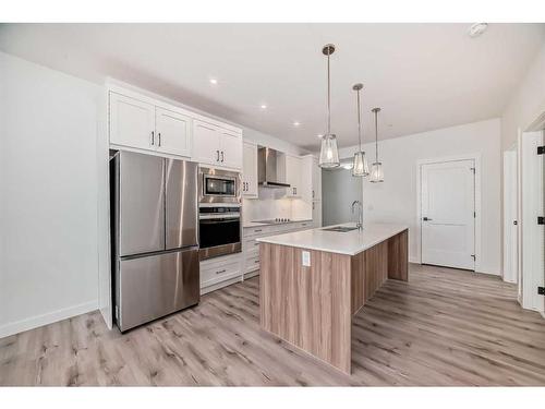 412-30 Sage Hill Nw, Calgary, AB - Indoor Photo Showing Kitchen With Stainless Steel Kitchen With Upgraded Kitchen