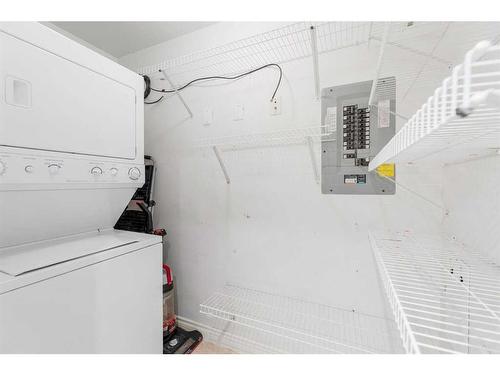 102-820 15 Avenue Sw, Calgary, AB - Indoor Photo Showing Laundry Room