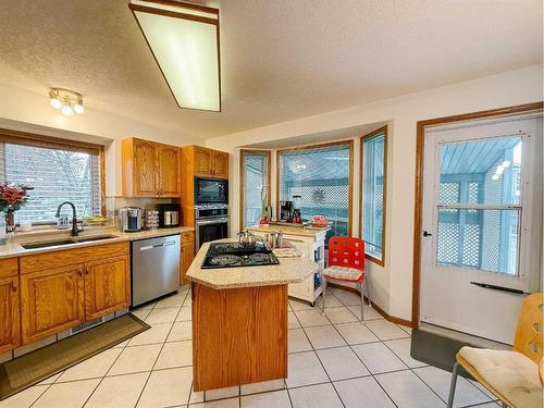 5720 58 Avenue, Olds, AB - Indoor Photo Showing Kitchen With Double Sink