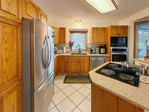 5720 58 Avenue, Olds, AB - Indoor Photo Showing Kitchen With Double Sink