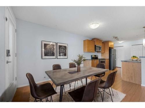 2105-700 Willowbrook Road Nw, Airdrie, AB - Indoor Photo Showing Dining Room