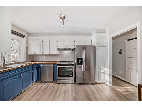 327 Avonburn Road Se, Calgary, AB - Indoor Photo Showing Kitchen With Stainless Steel Kitchen With Double Sink