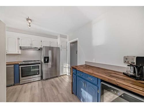 327 Avonburn Road Se, Calgary, AB - Indoor Photo Showing Kitchen With Stainless Steel Kitchen