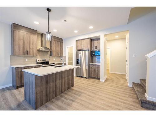 94 Finch Gardens Se, Calgary, AB - Indoor Photo Showing Kitchen With Stainless Steel Kitchen With Upgraded Kitchen