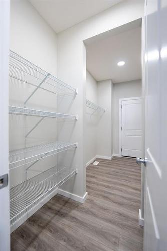 94 Finch Gardens Se, Calgary, AB - Indoor With Storage