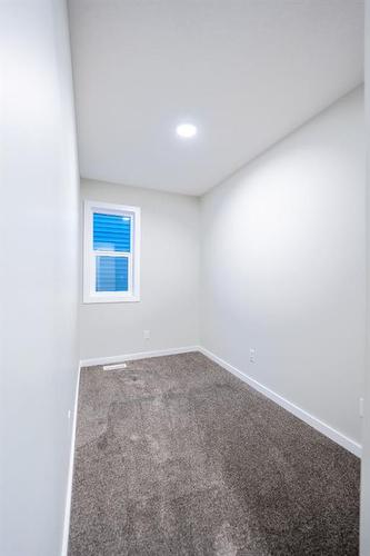 94 Finch Gardens Se, Calgary, AB - Indoor Photo Showing Other Room