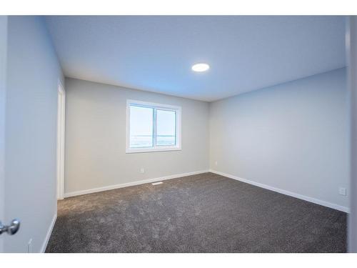 94 Finch Gardens Se, Calgary, AB - Indoor Photo Showing Other Room