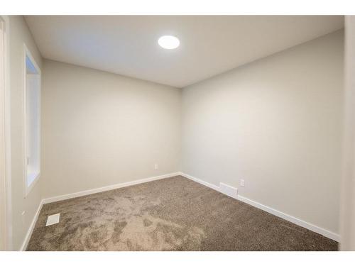 94 Finch Gardens Se, Calgary, AB - Indoor Photo Showing Other Room