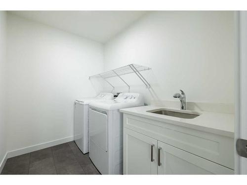 3093 Key Drive Sw, Airdrie, AB - Indoor Photo Showing Laundry Room