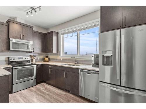 1545 Symons Valley Parkway Nw, Calgary, AB - Indoor Photo Showing Kitchen With Stainless Steel Kitchen With Double Sink With Upgraded Kitchen