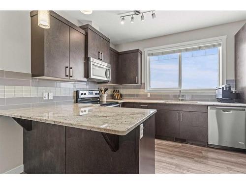 1545 Symons Valley Parkway Nw, Calgary, AB - Indoor Photo Showing Kitchen With Upgraded Kitchen