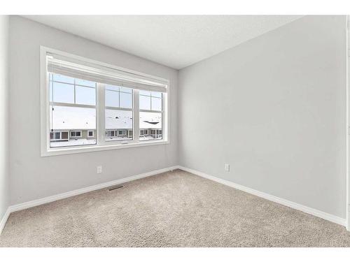 350 Hillcrest Square Sw, Airdrie, AB - Indoor Photo Showing Other Room