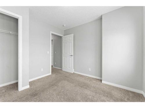 350 Hillcrest Square Sw, Airdrie, AB - Indoor Photo Showing Other Room