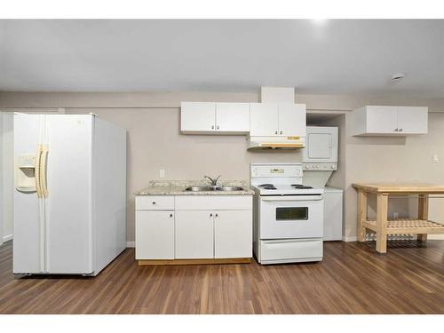 752 Fortalice Crescent Se, Calgary, AB - Indoor Photo Showing Kitchen With Double Sink