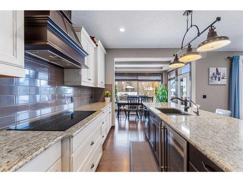 624 Quarry Way Se, Calgary, AB - Indoor Photo Showing Kitchen With Double Sink