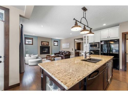 624 Quarry Way Se, Calgary, AB - Indoor Photo Showing Kitchen With Double Sink