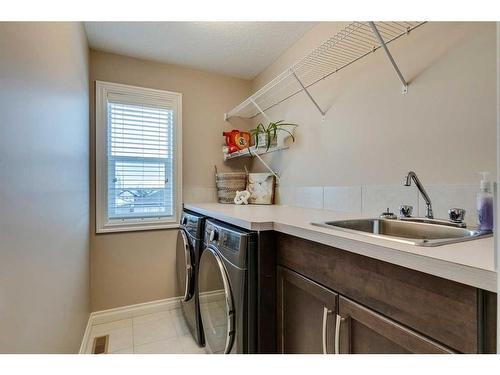 151 Auburn Sound Circle Se, Calgary, AB - Indoor Photo Showing Laundry Room