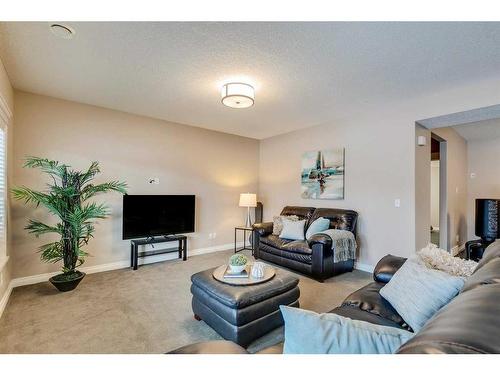 151 Auburn Sound Circle Se, Calgary, AB - Indoor Photo Showing Living Room