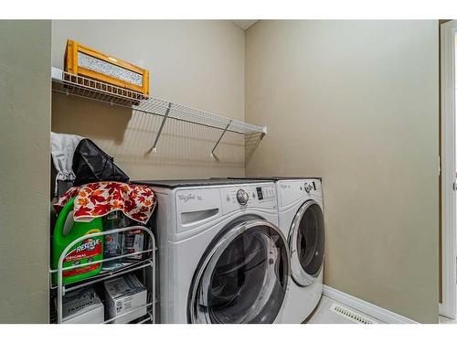 355 Walden Mews Se, Calgary, AB - Indoor Photo Showing Laundry Room